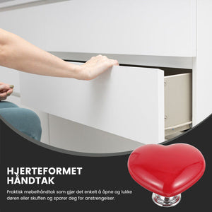 Hjerteformet toalettknapp