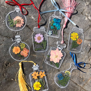 Gjennomsiktige bokmerker for tørkede blomster